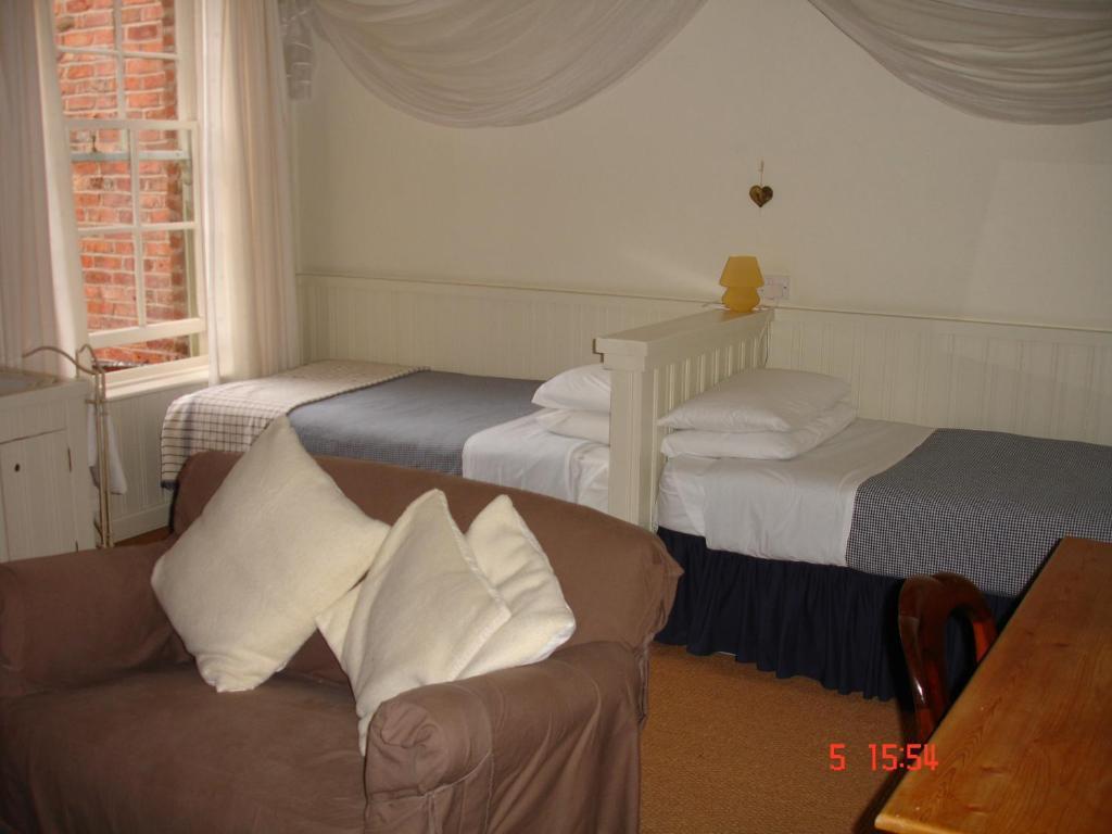 Cornerstones Guest House Sale Værelse billede